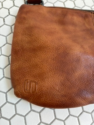 Spikes & Sparrow Distressed Leather Sling Bag in Cognac