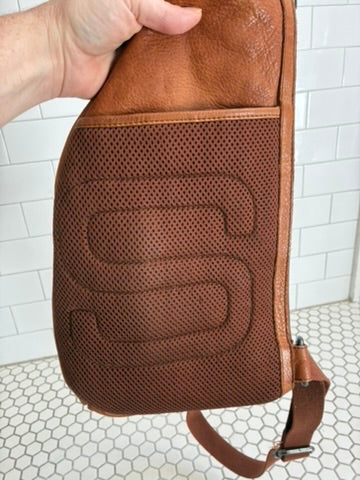 Spikes & Sparrow Distressed Leather Sling Bag in Cognac