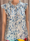 Delft patterned sleeveless blouse with ruffles