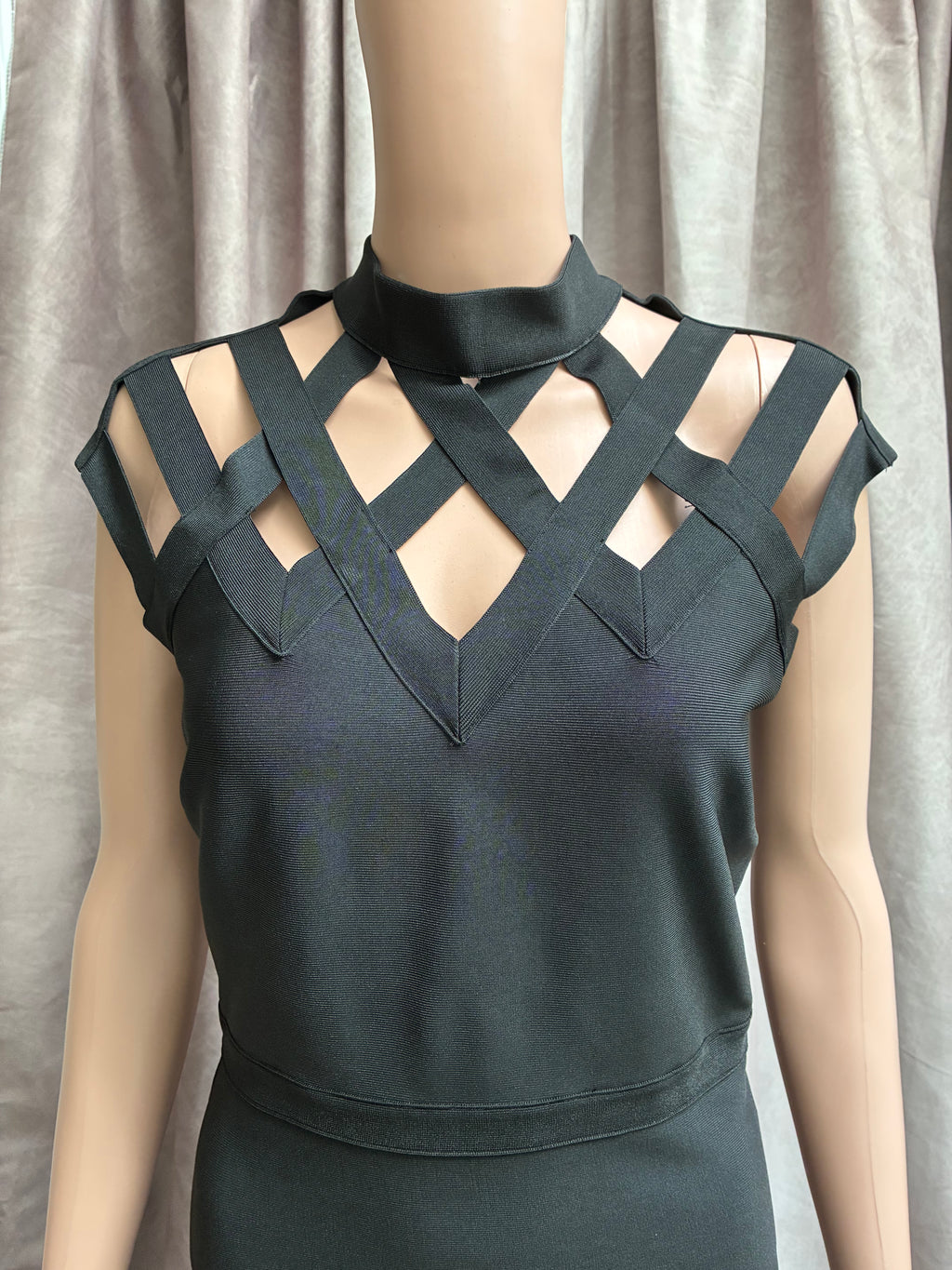 Black body con dress with caged structured shoulders