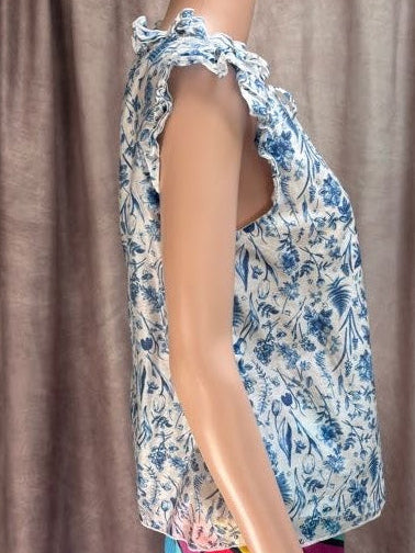 Delft patterned sleeveless blouse with ruffles