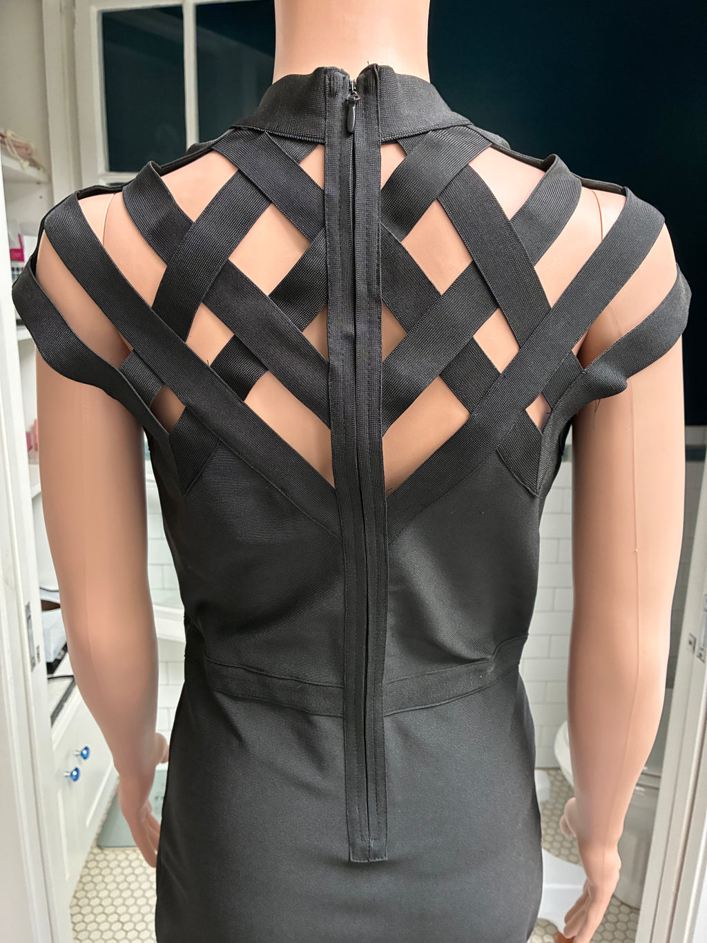 Black body con dress with caged structured shoulders